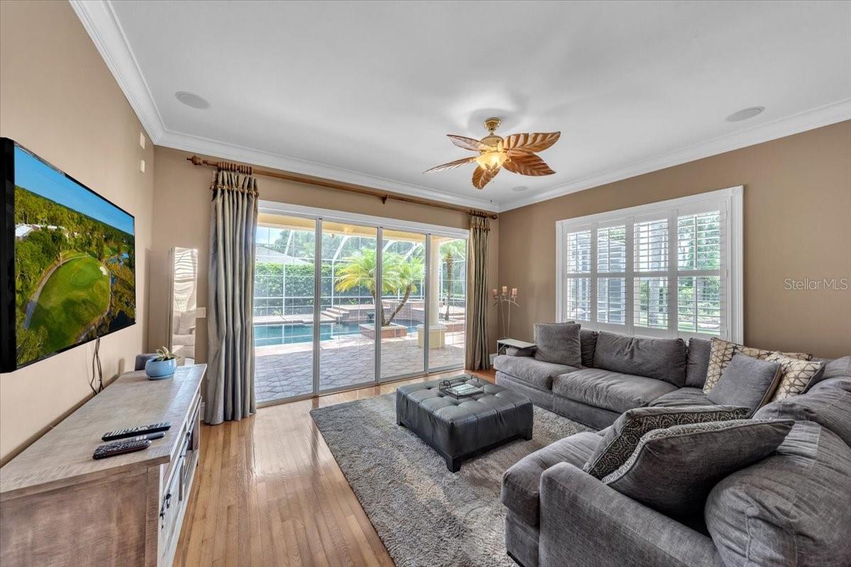 Bonus room with built-in speakers and lanai access—made for entertaining!
