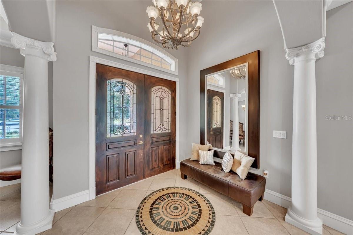 Double-leaded glass doors welcome you to refined interiors!