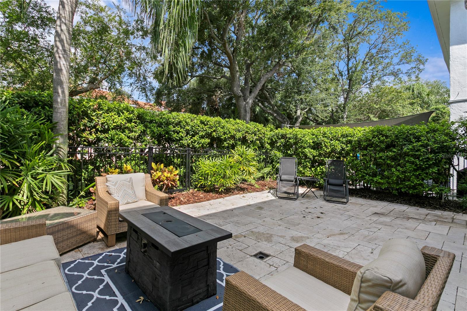 You can enjoy the shade provided by the awning, with plenty of space for a grill and outdoor seating.
