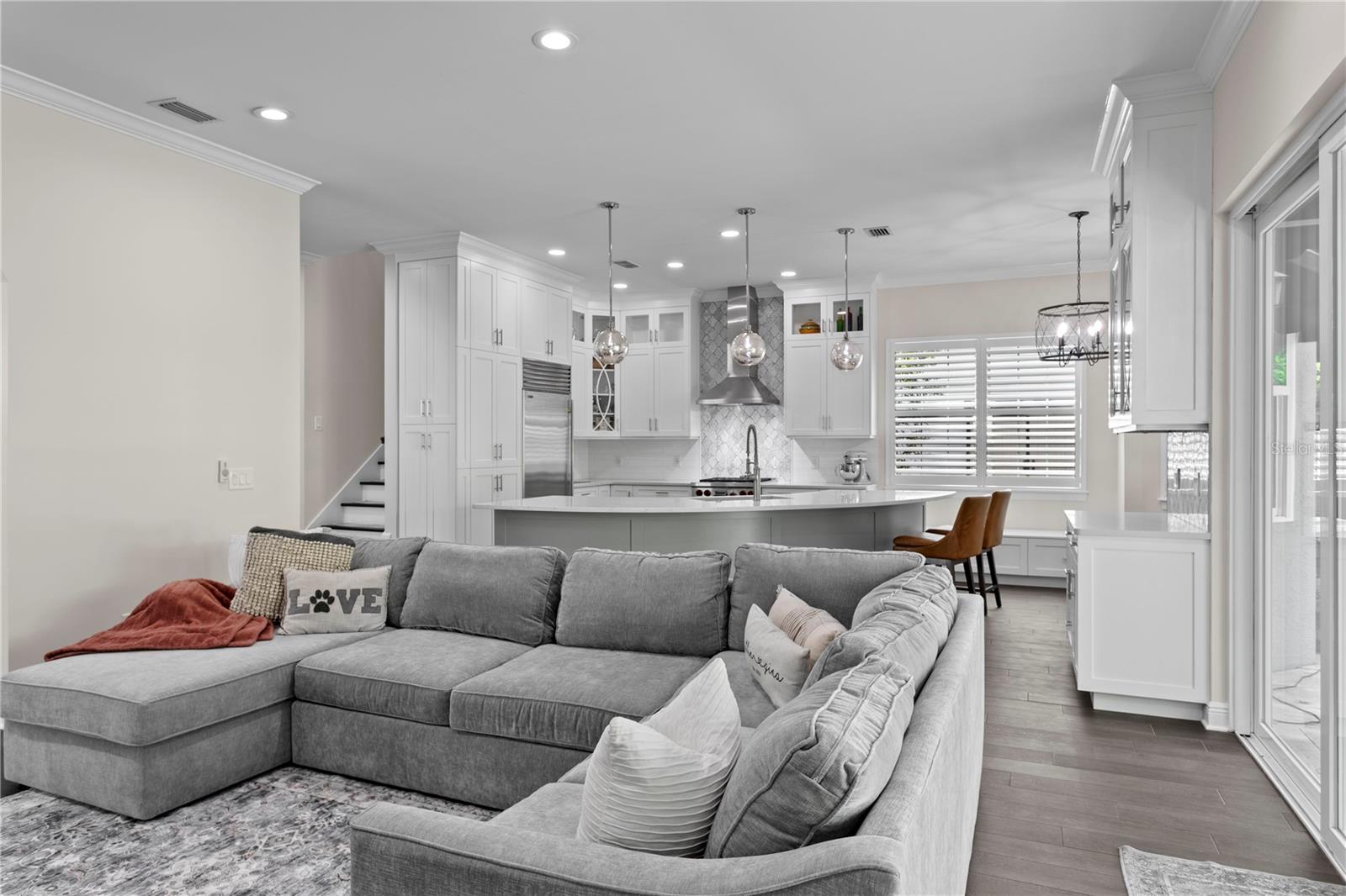 The downstairs floor plan provides exceptional flow between formal and informal spaces