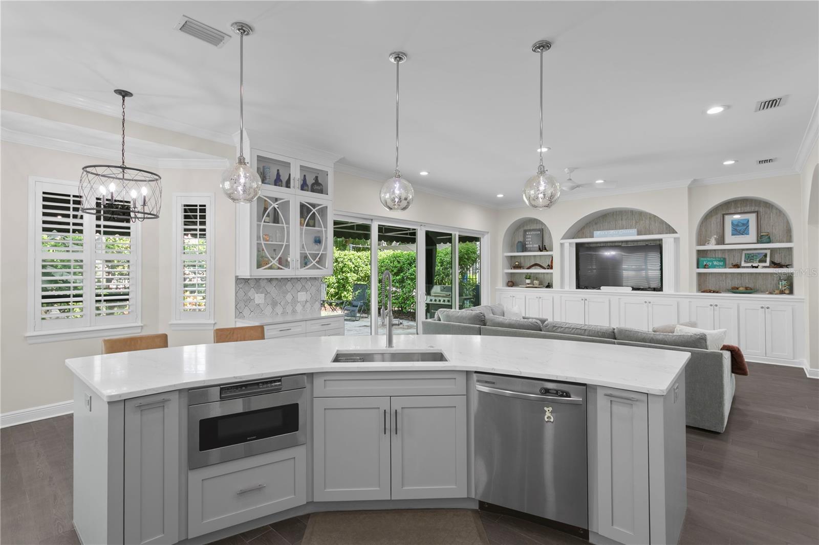 The open floor plan keeps you connected, allowing you to be part of the conversation while in the kitchen, even as others relax in the family room.