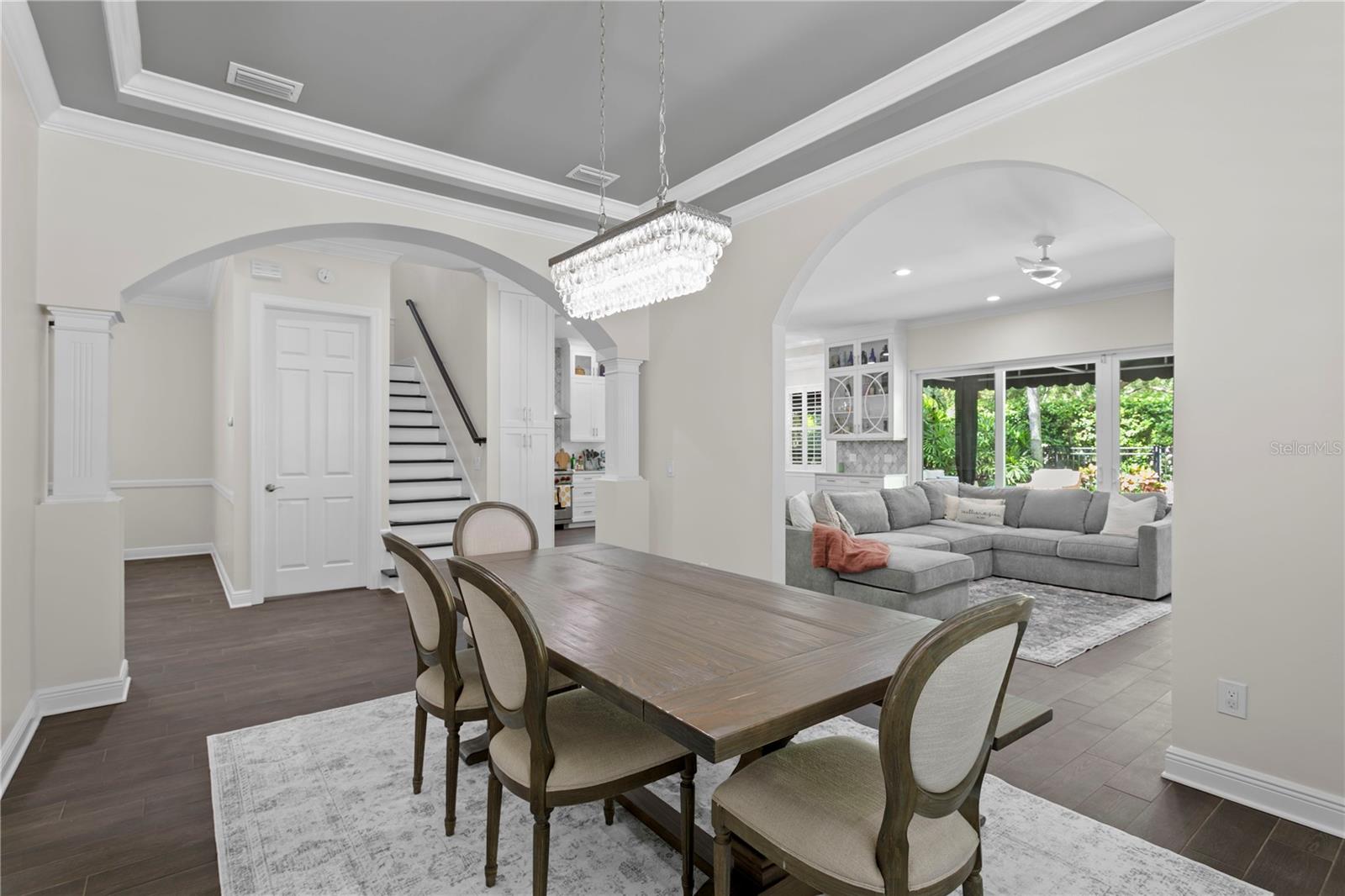 The formal dining room is perfectly positioned adjacent to the kitchen and family room, keeping you close to all the action.