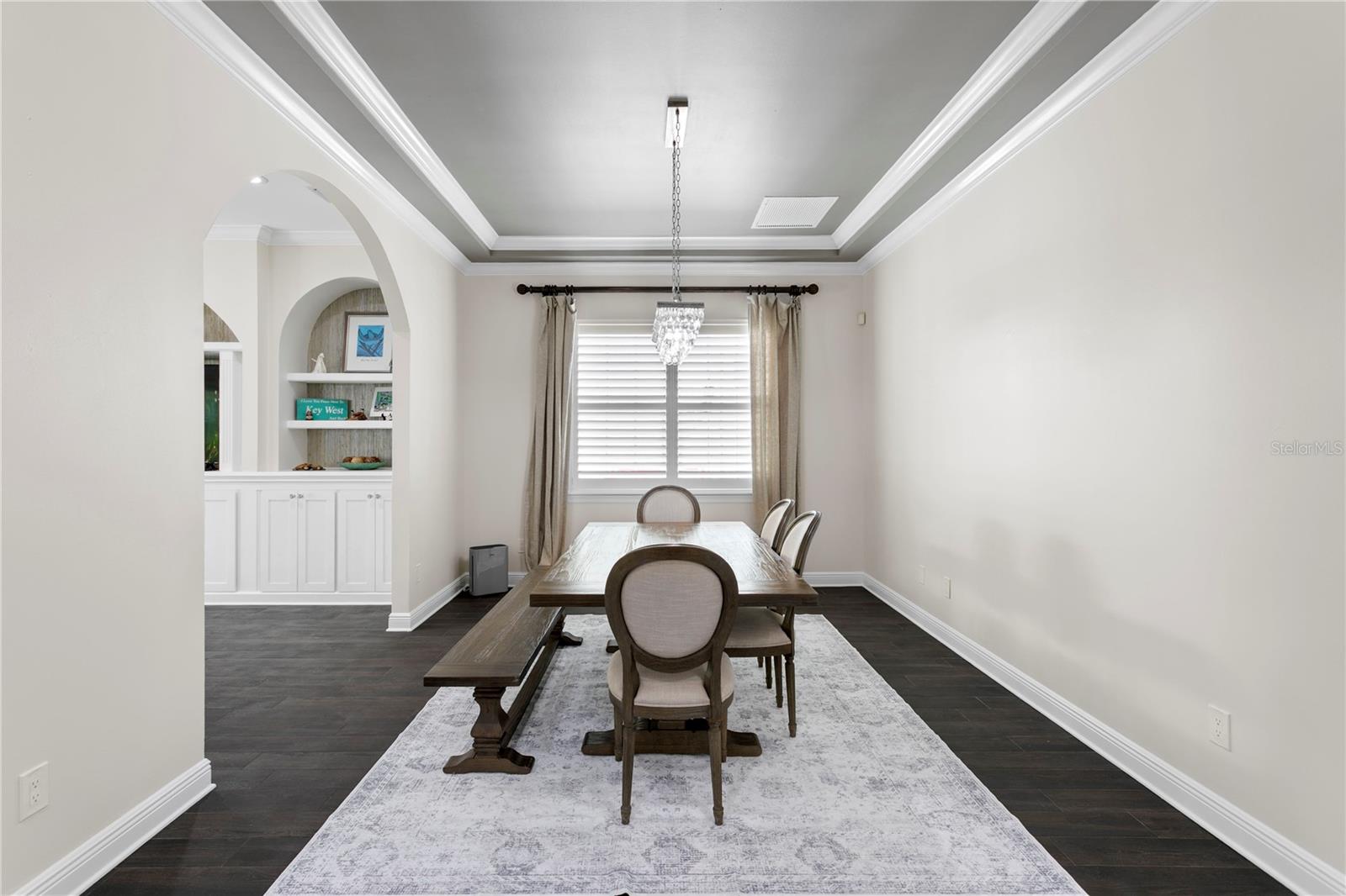 The formal dining room is perfectly positioned adjacent to the kitchen and family room, keeping you close to all the action.