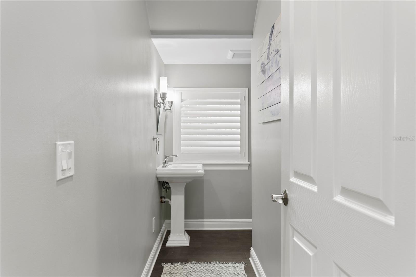 A convenient half bathroom downstairs
