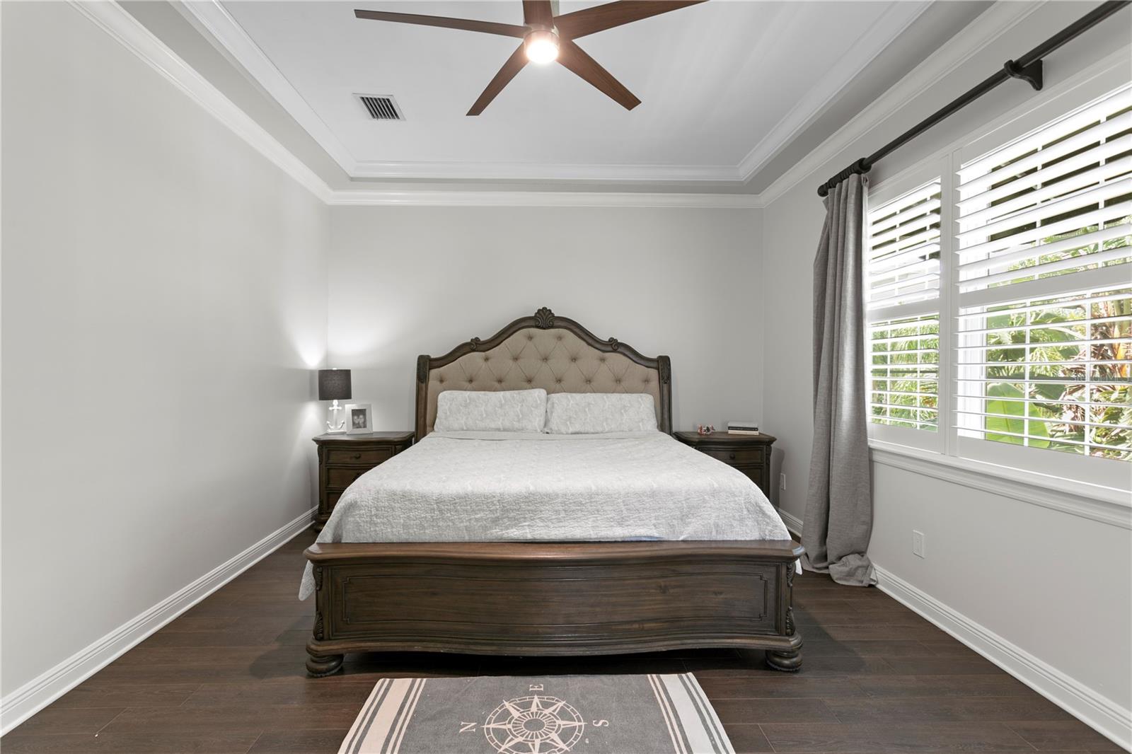 The spacious primary bedroom