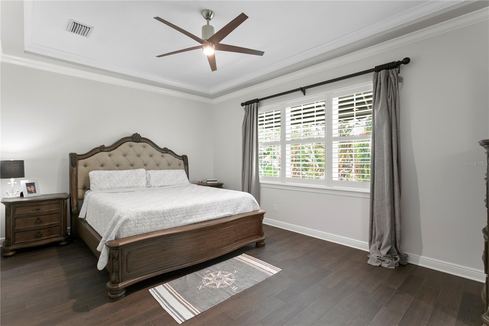 The master’s suite overlooks the Island’s lushly landscaped Central Park