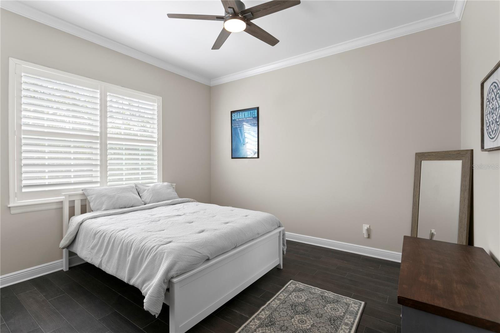 The fourth bedroom offers additional living space for family or guests