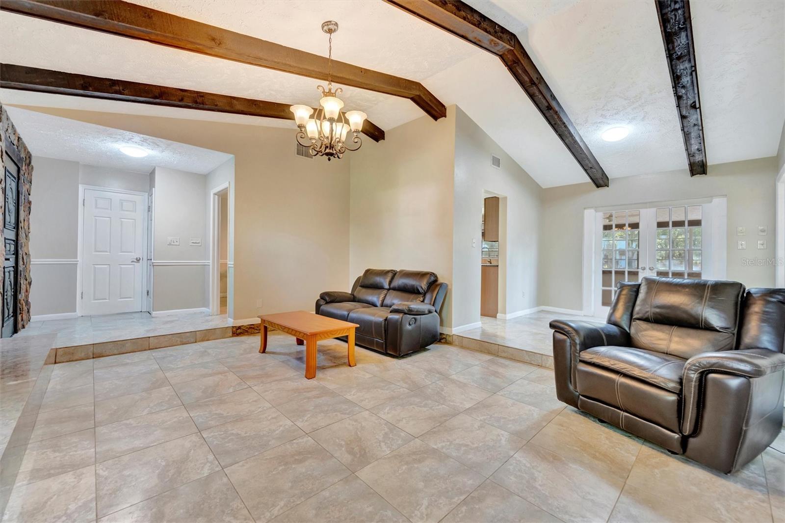 Bright open living room with high ceilings