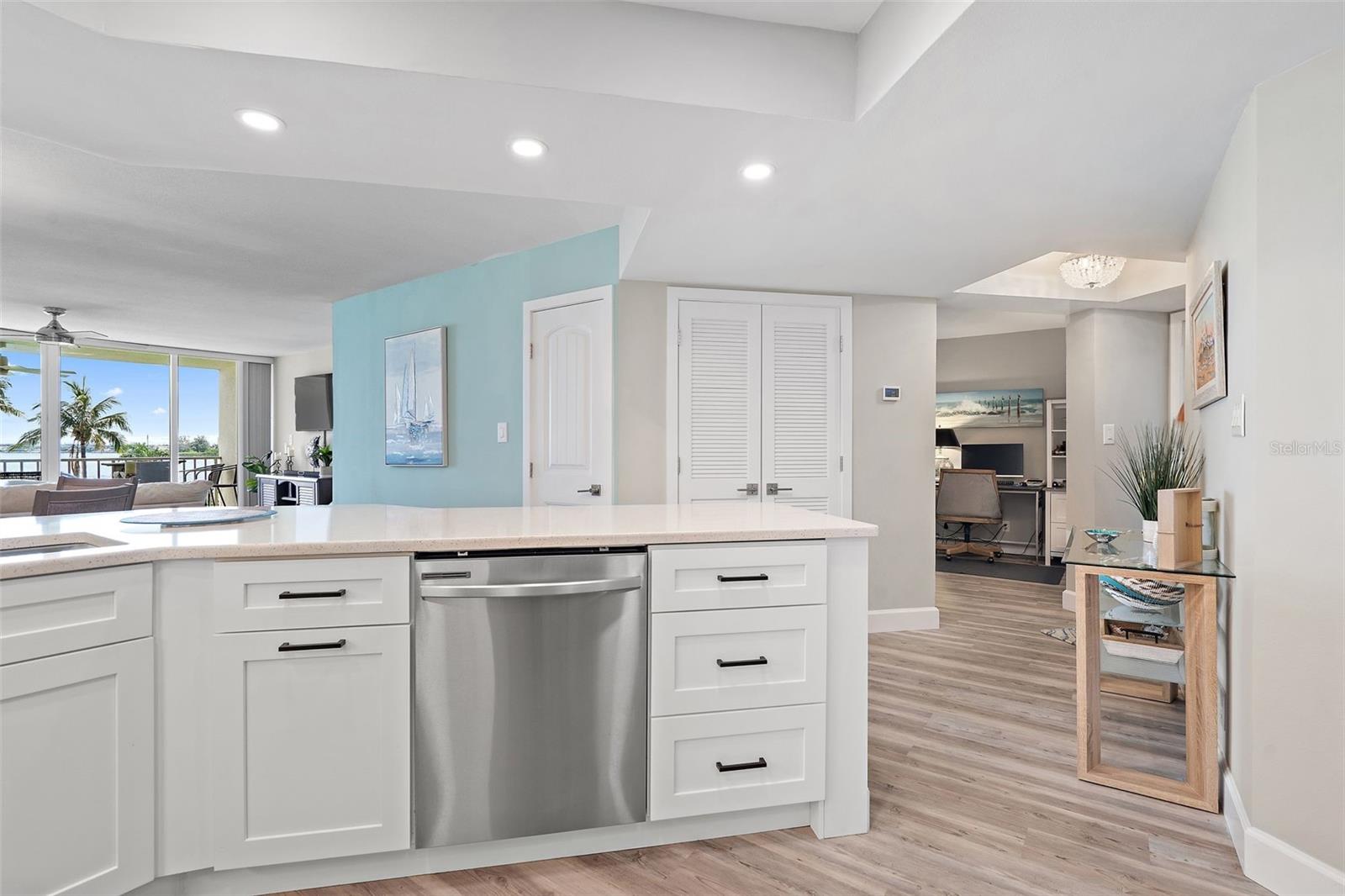Custom doors that house the A/C & HWH &  A look into the office