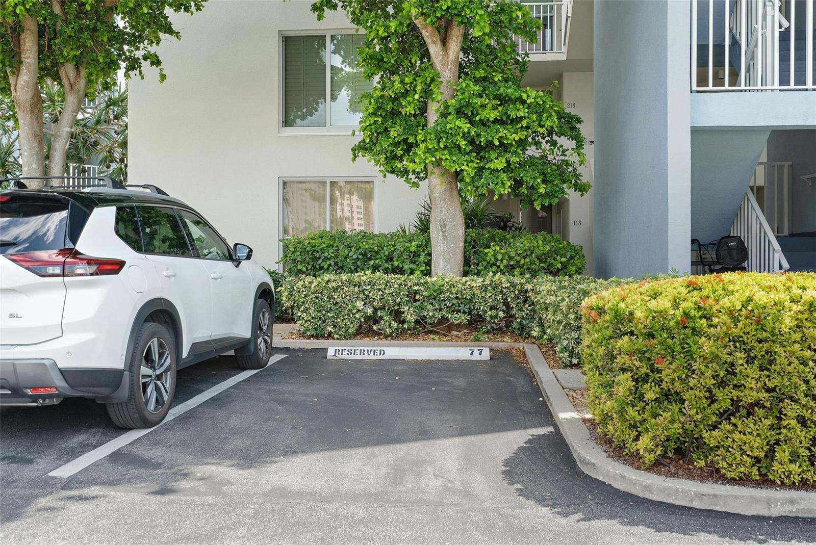 Shaded parking space just steps from condo