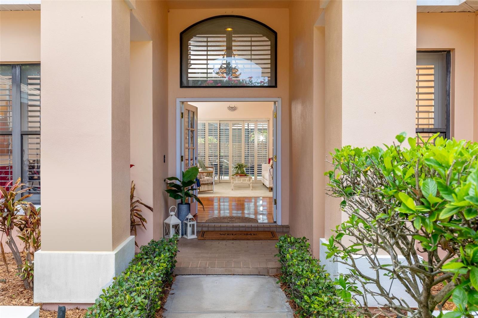 Front Entrance through French Doors into Foyer