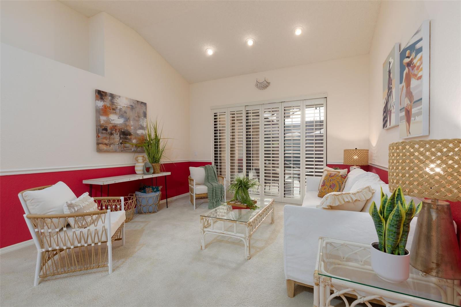 Formal Living Room with Sliders to Pool/Spa and Plantation Shutters