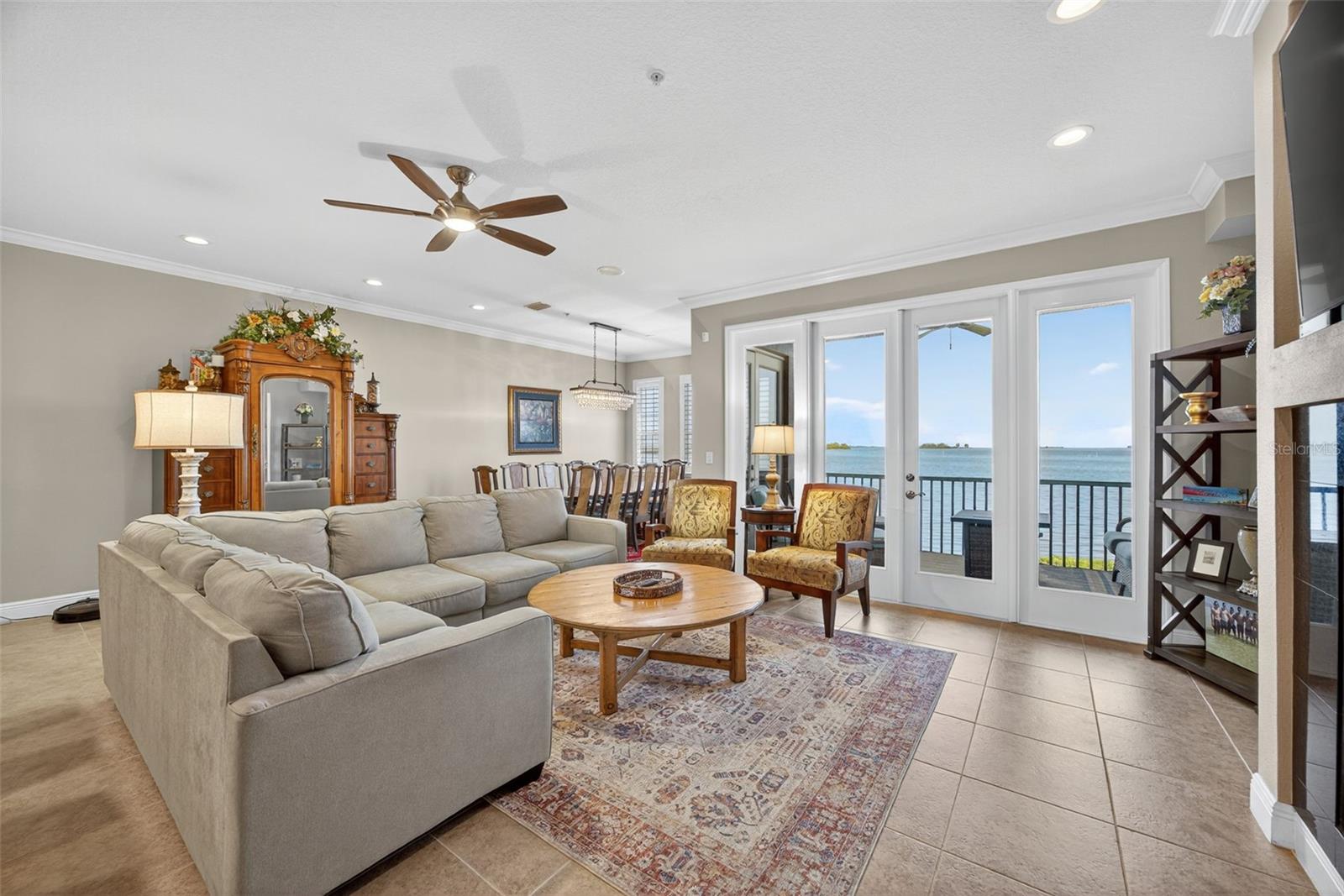 Living Room with balcony & water views