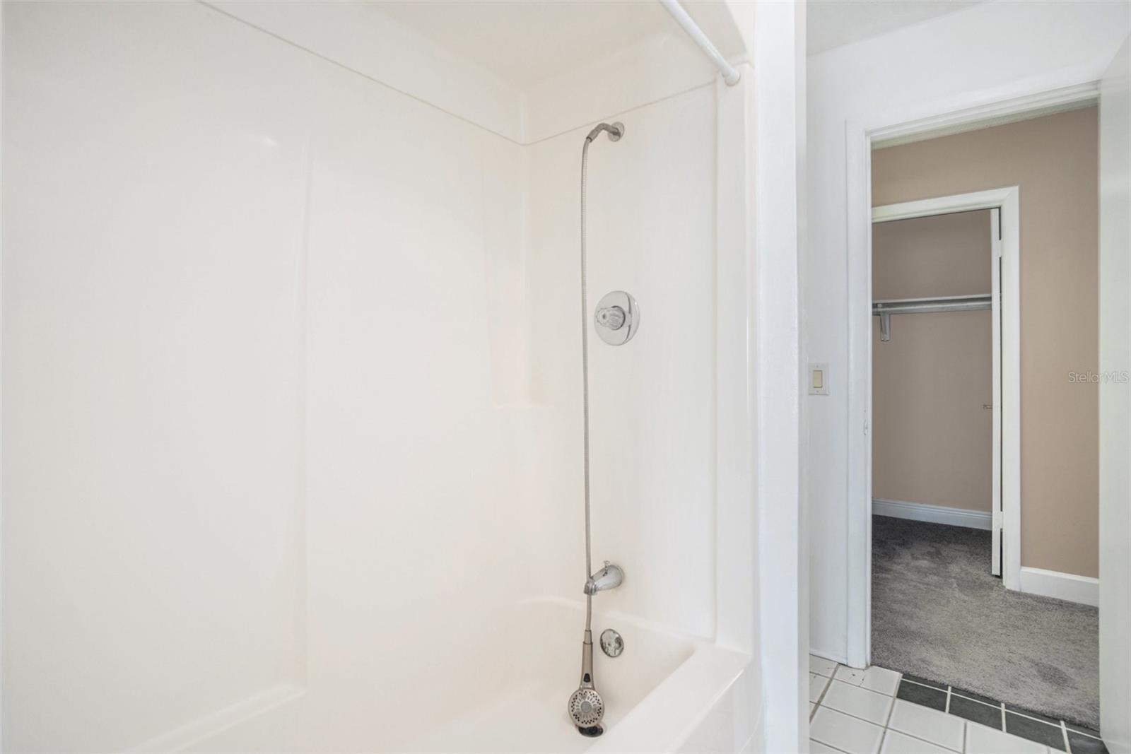 Jack & Jill style shower/toilet area between the 2 private sink areas.