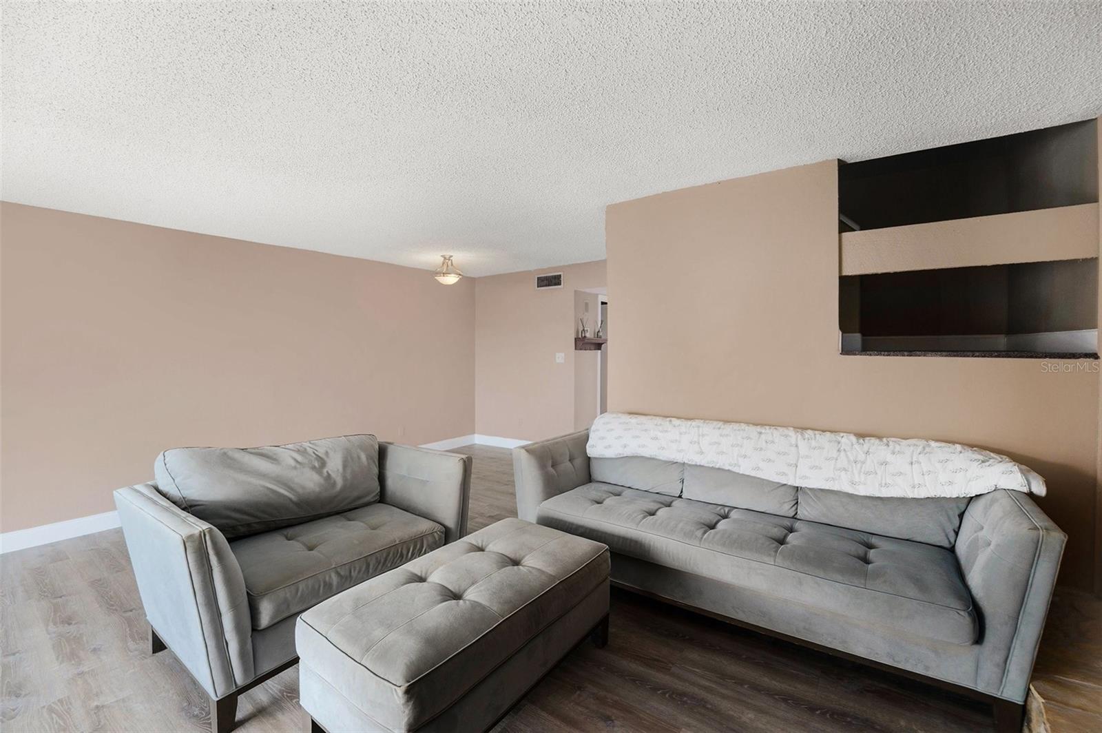Living room looking to dining area