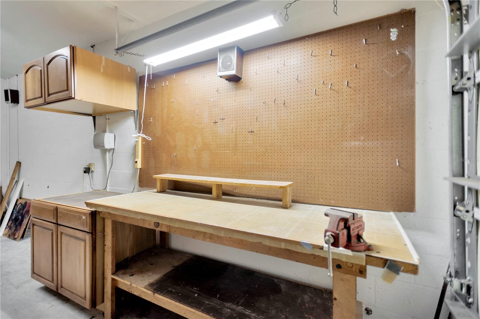 Handy work bench and cabinets in the 3rd car garage (we're still in the process of removing items from the garage).