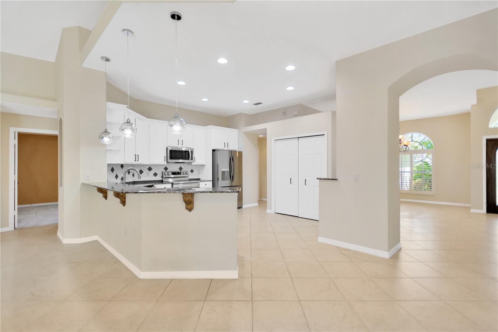 To the right of the double door pantry is a built-in desk area, great for doing homework or checking email.