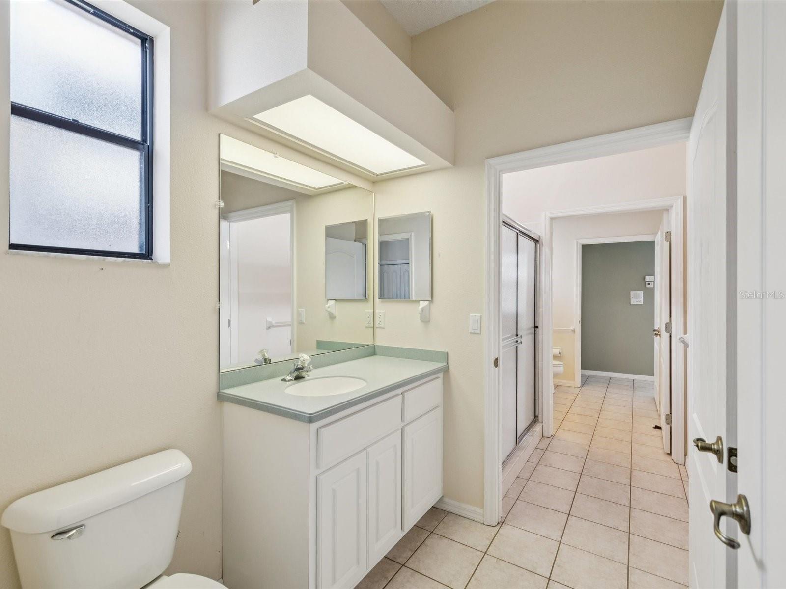connected to separates sink and commodes