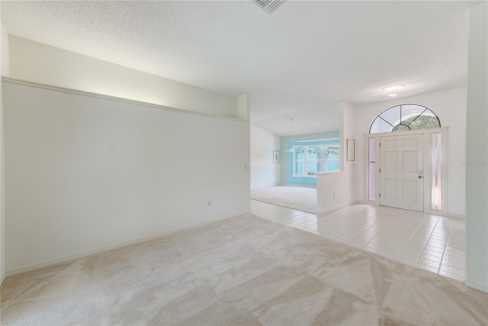 View from formal living room to formal dining room