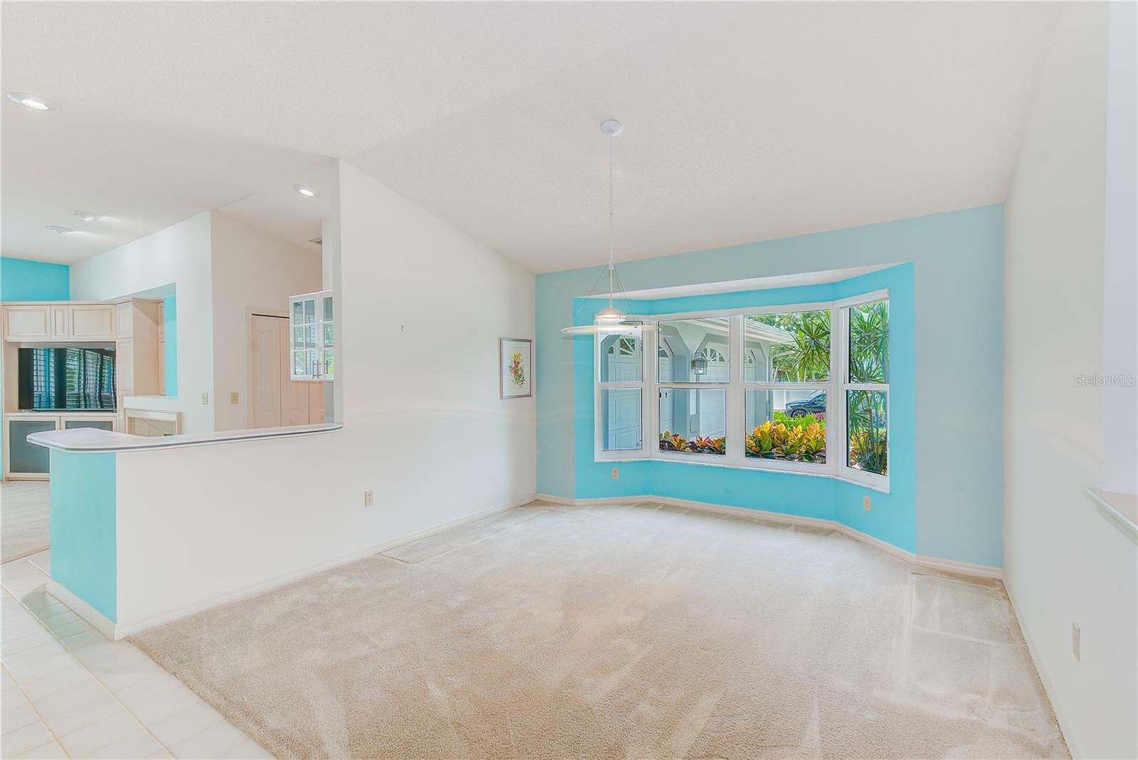 Formal dining room with hurricane impact windows