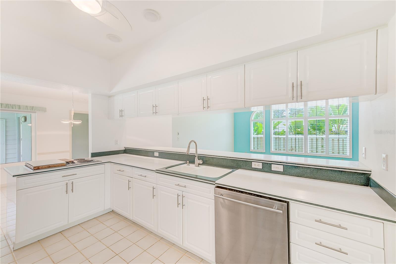 Kitchen with Corian countertops and tons of cabinet space