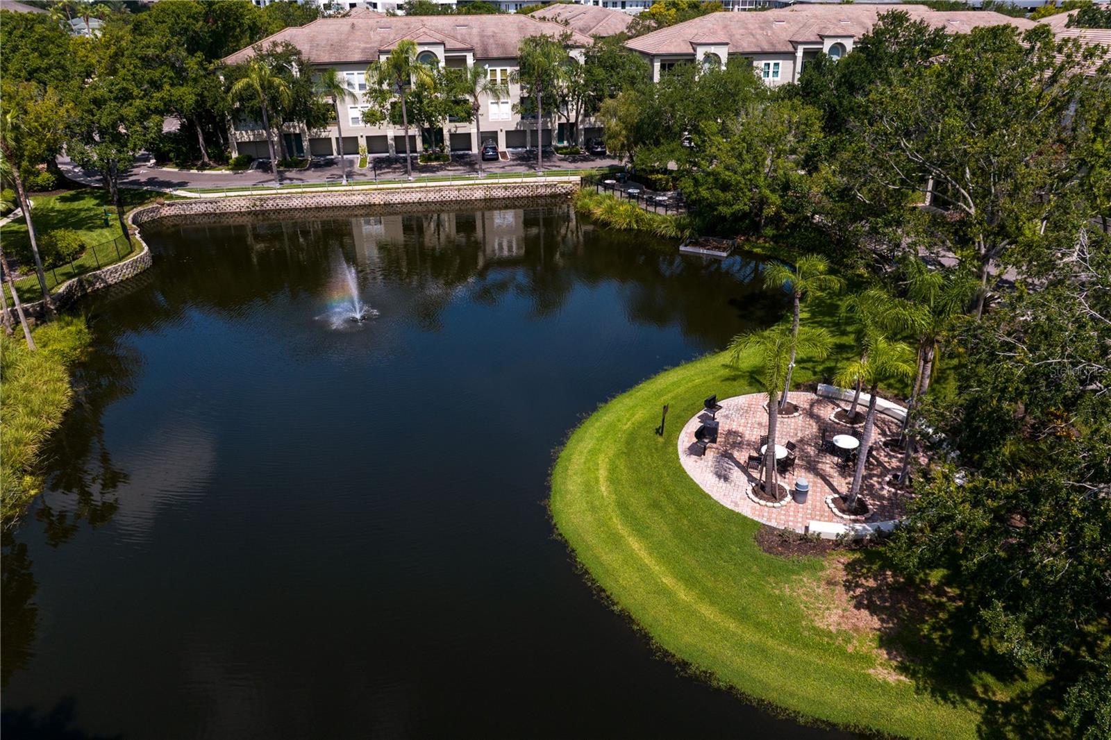 Beautifully maintained grounds and shared grilling space
