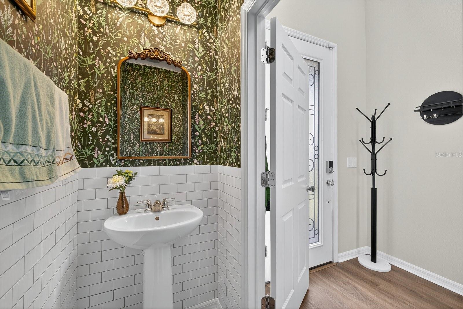 Downstairs Guest Bathroom located in Foyer