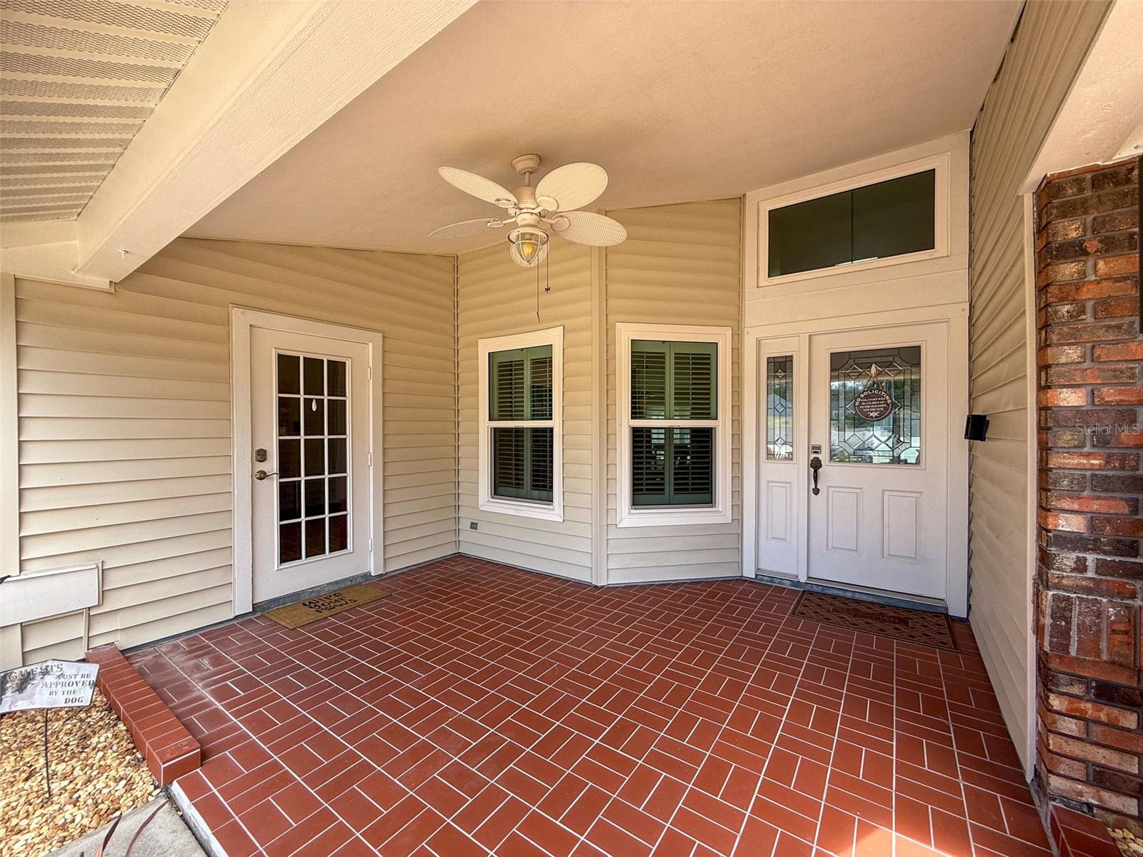 Covered front patio to talk with the neighbors.
