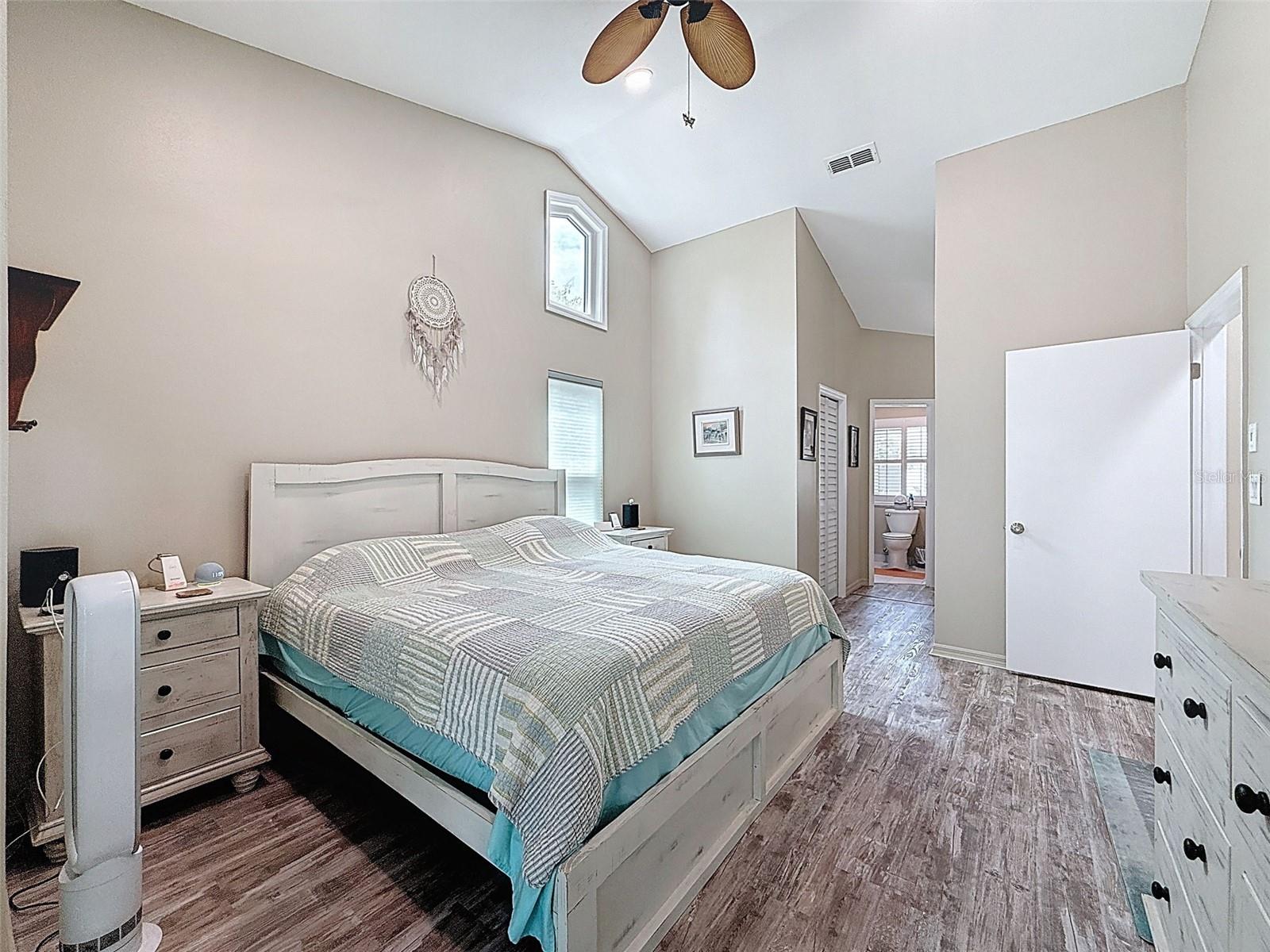 Master bedroom suite with private full bathroom and two WICs