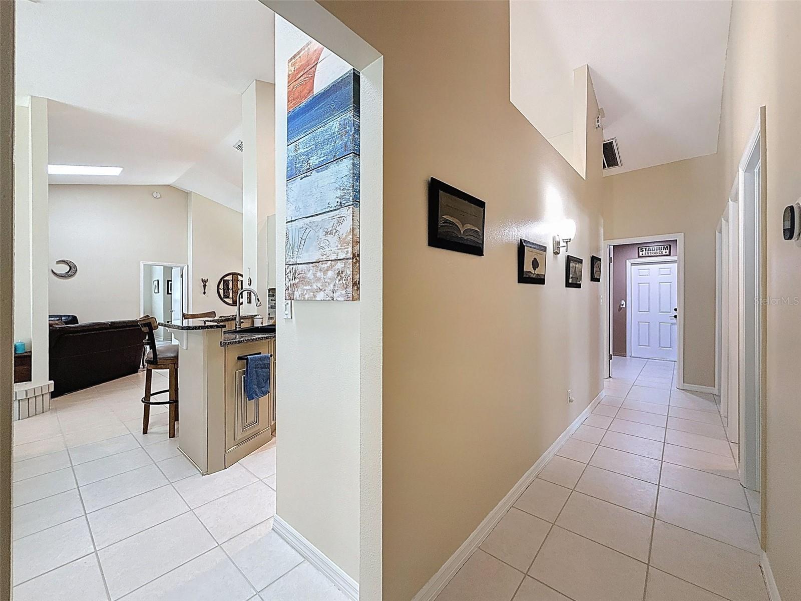 Hallway leading to THREE other bedrooms