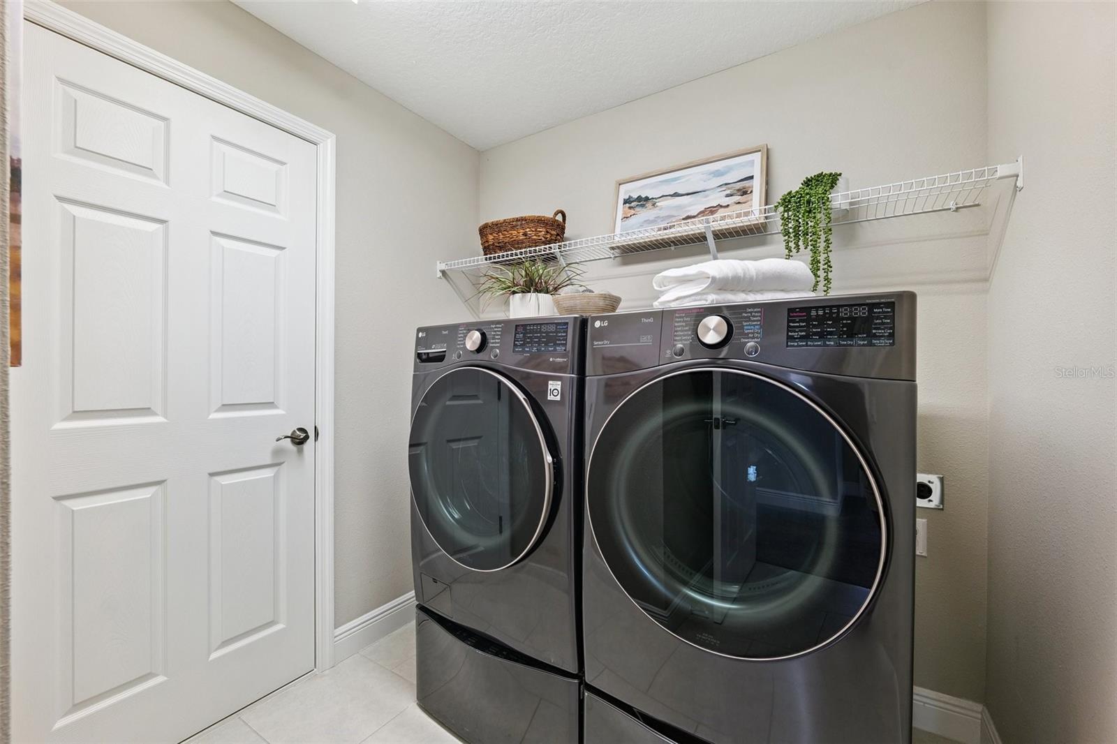 Inside, upstairs spacious laundry room