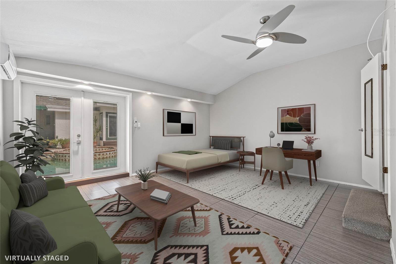 Virtually Staged. Guesthouse in the rear of the property with its own full en-suite bathroom.