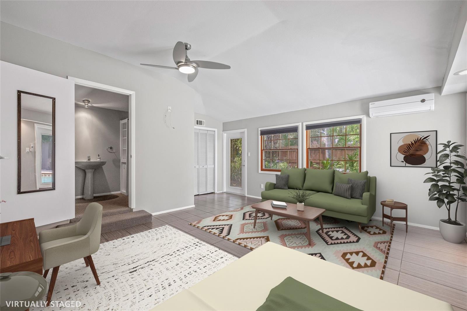 Virtually staged Guesthouse with view of en-suite bathroom. This space also has a full closet.