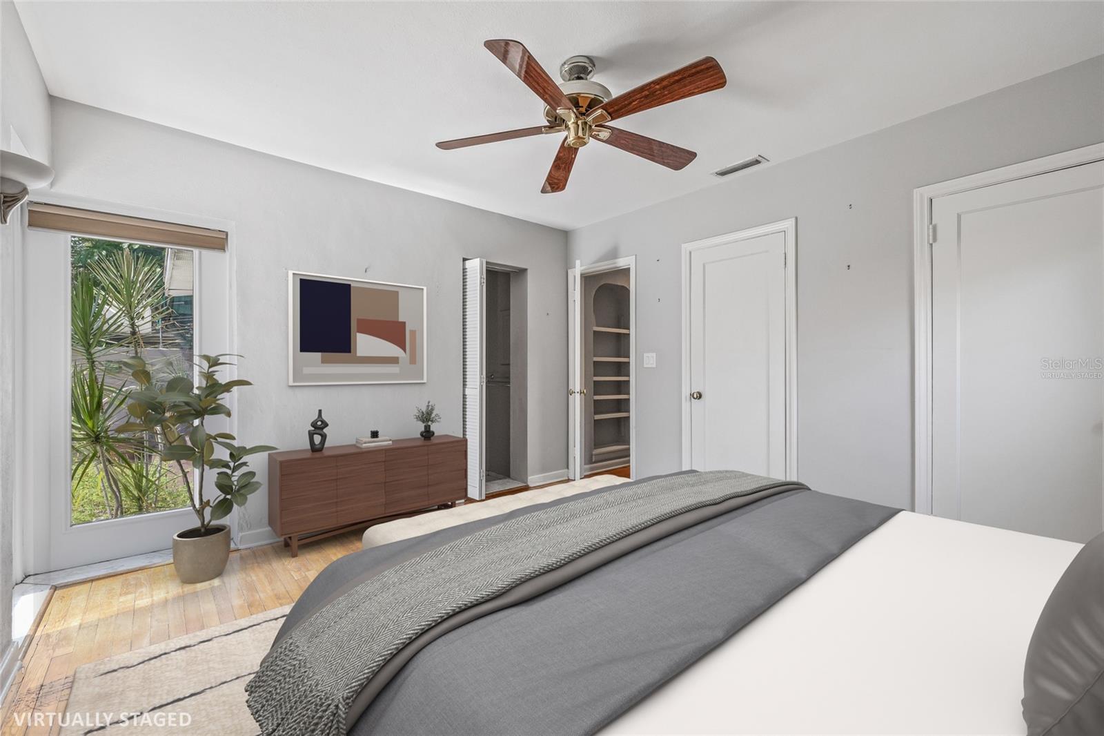 Virtually staged rear bedroom.