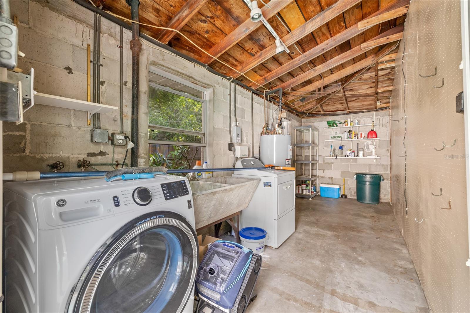 Laundry facilities adjacent to the guesthouse.