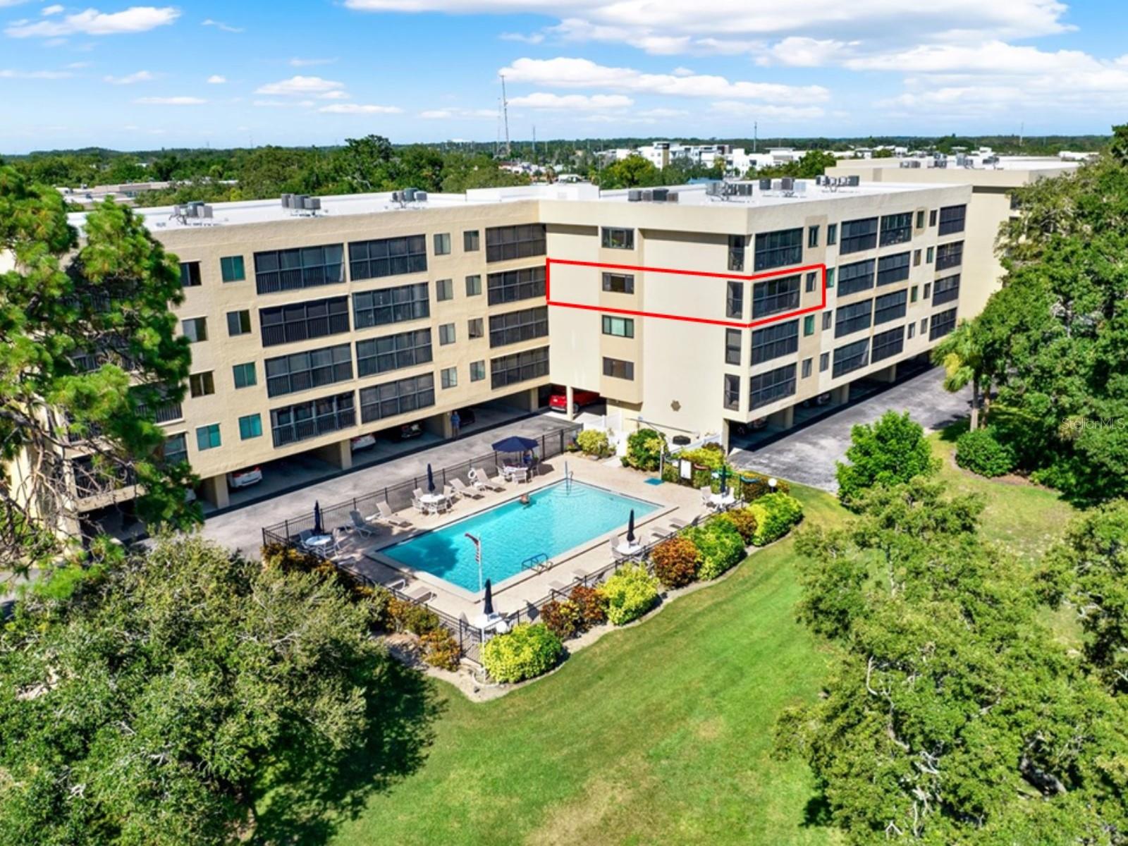 Front View: Corner Condo with Golf Course and Pool Views