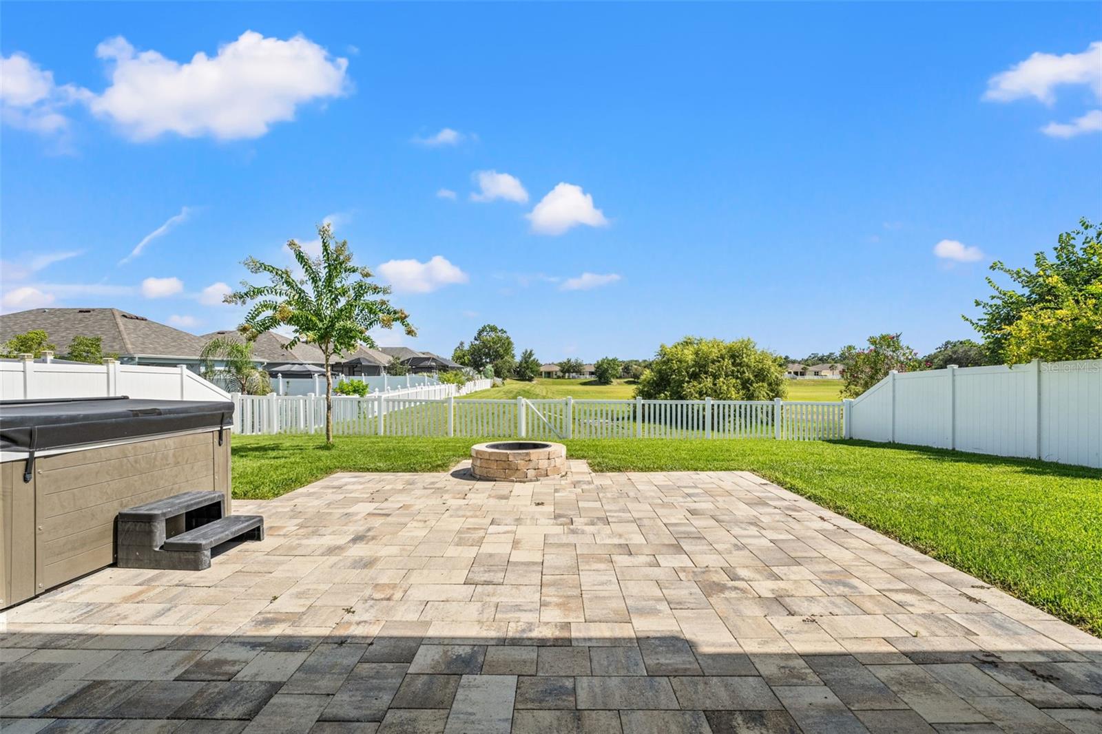 back yard, fire pit and hot tub