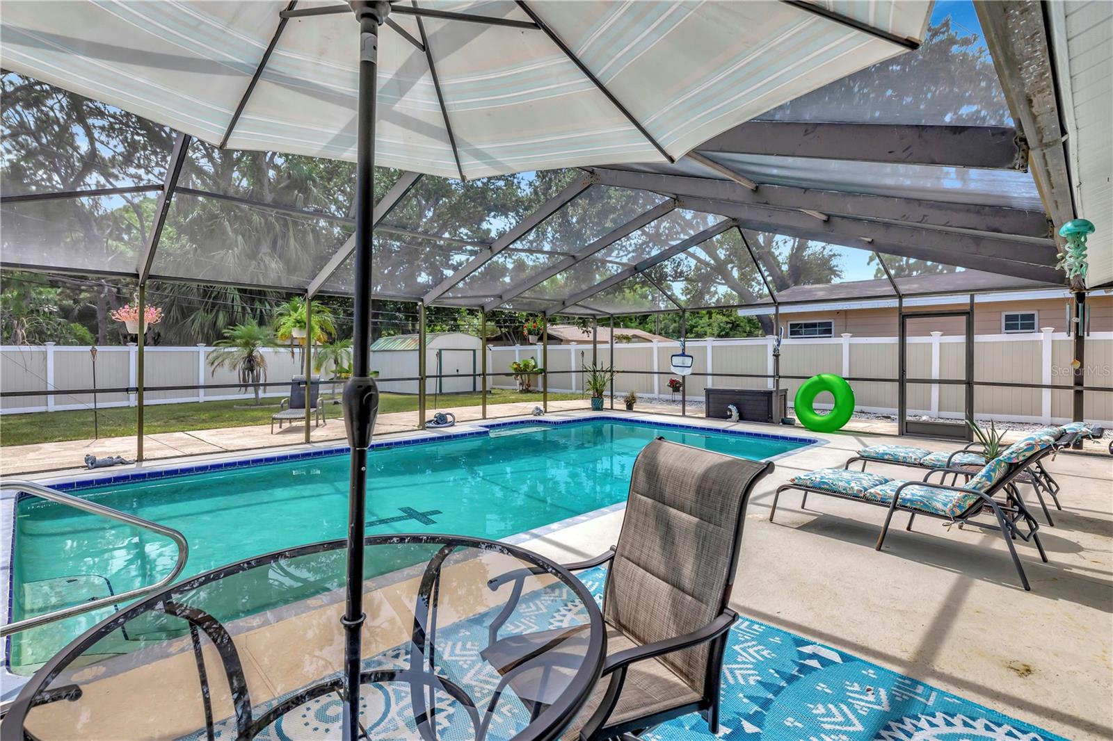 Screened in large lanai around pool