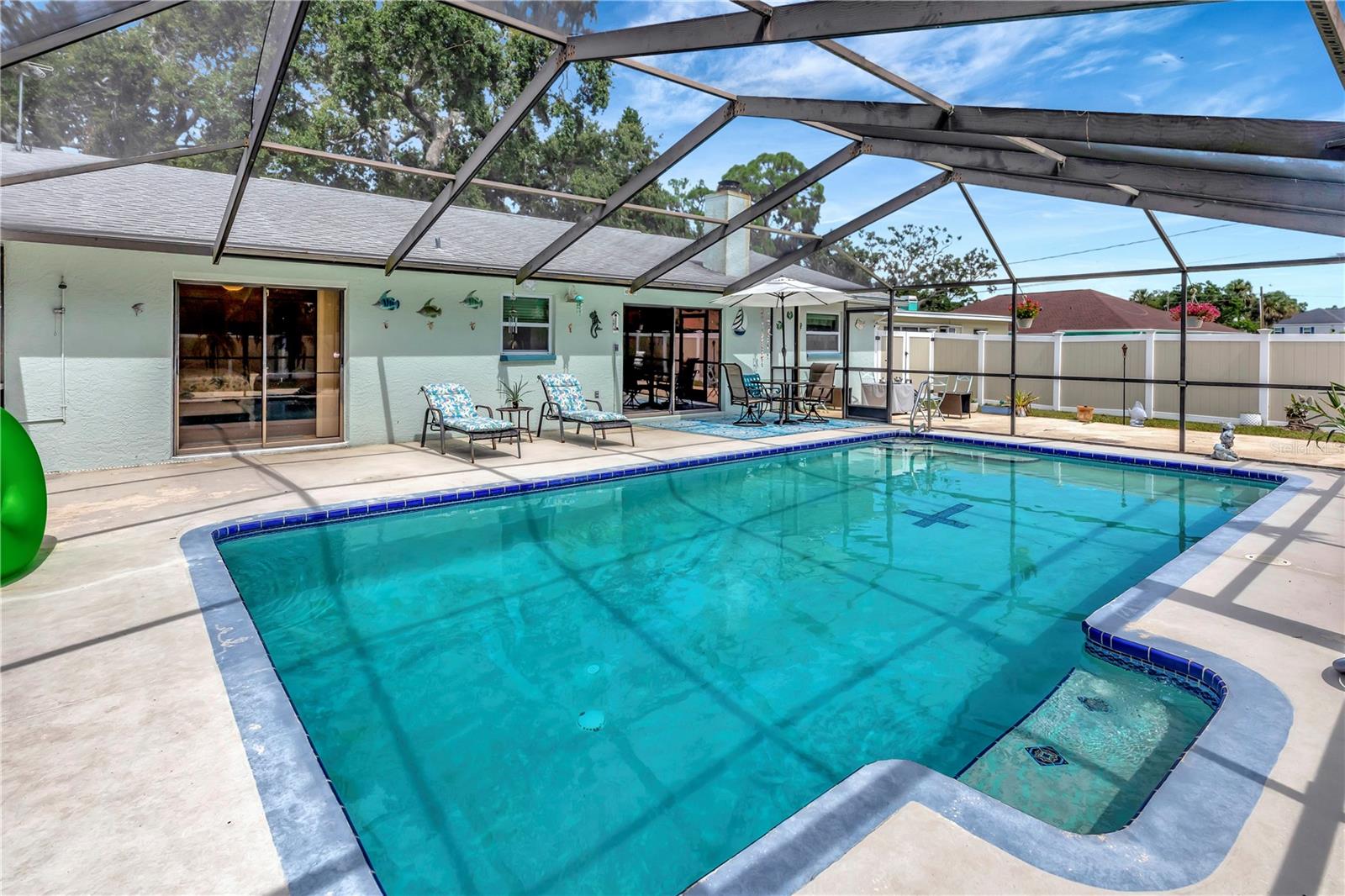 Screened in large lanai around pool