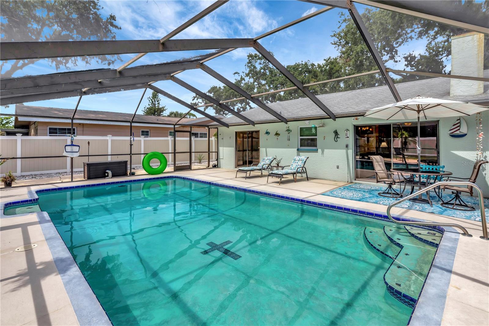 Screened in large lanai around pool