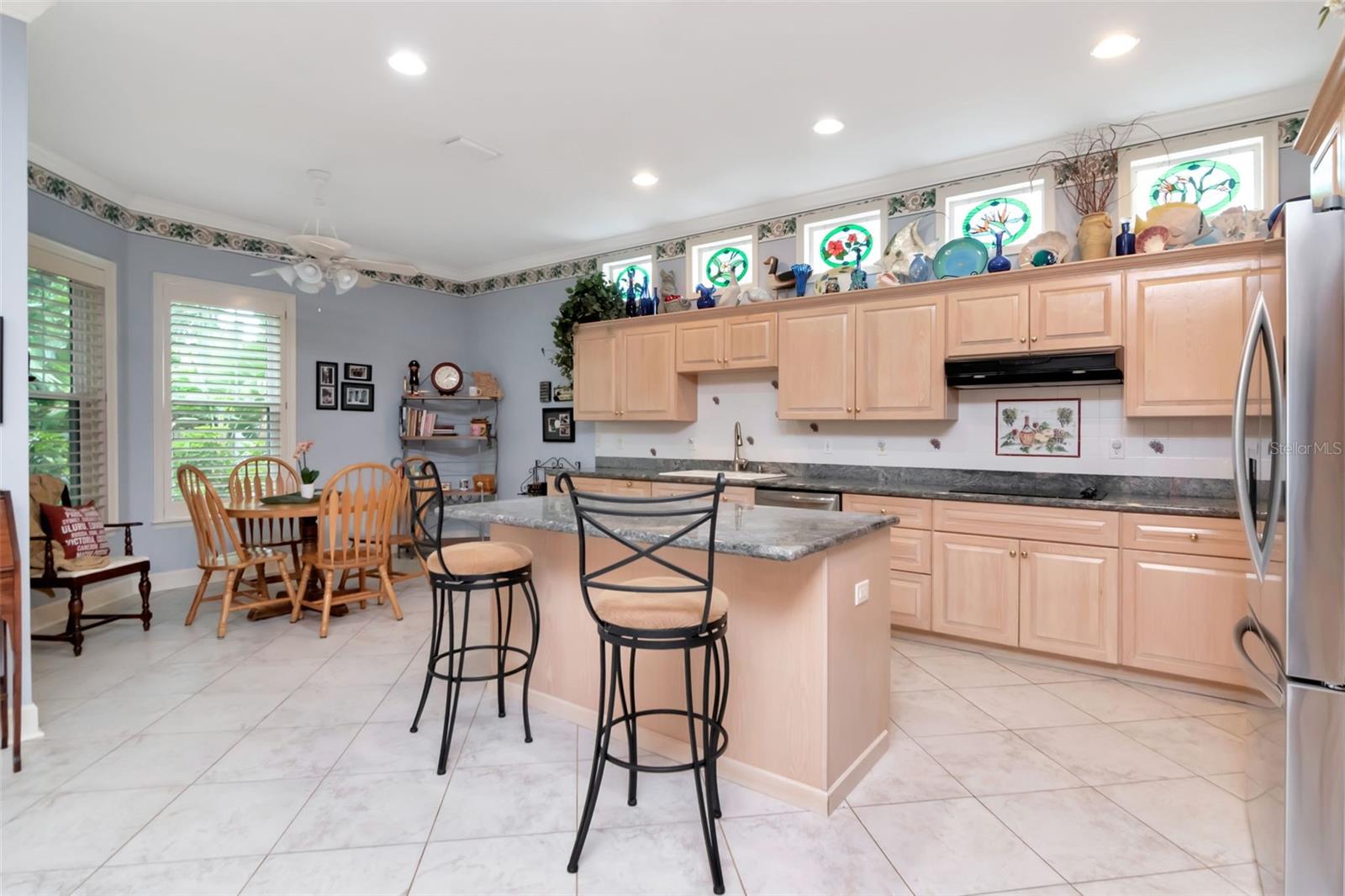 The cook can join in the activity of the family room and breakfast area.