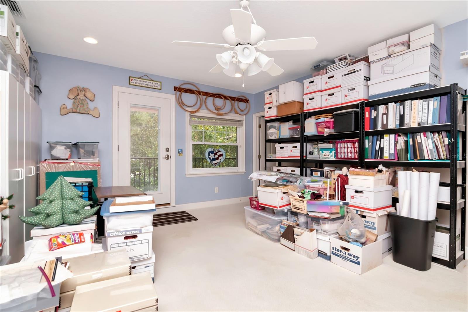 Owners are still working on emptying Bedroom 4 which makes an ideal guest suite, located at the end of the house over the garage with a private bath, walk in closet and balcony overlooking the park.