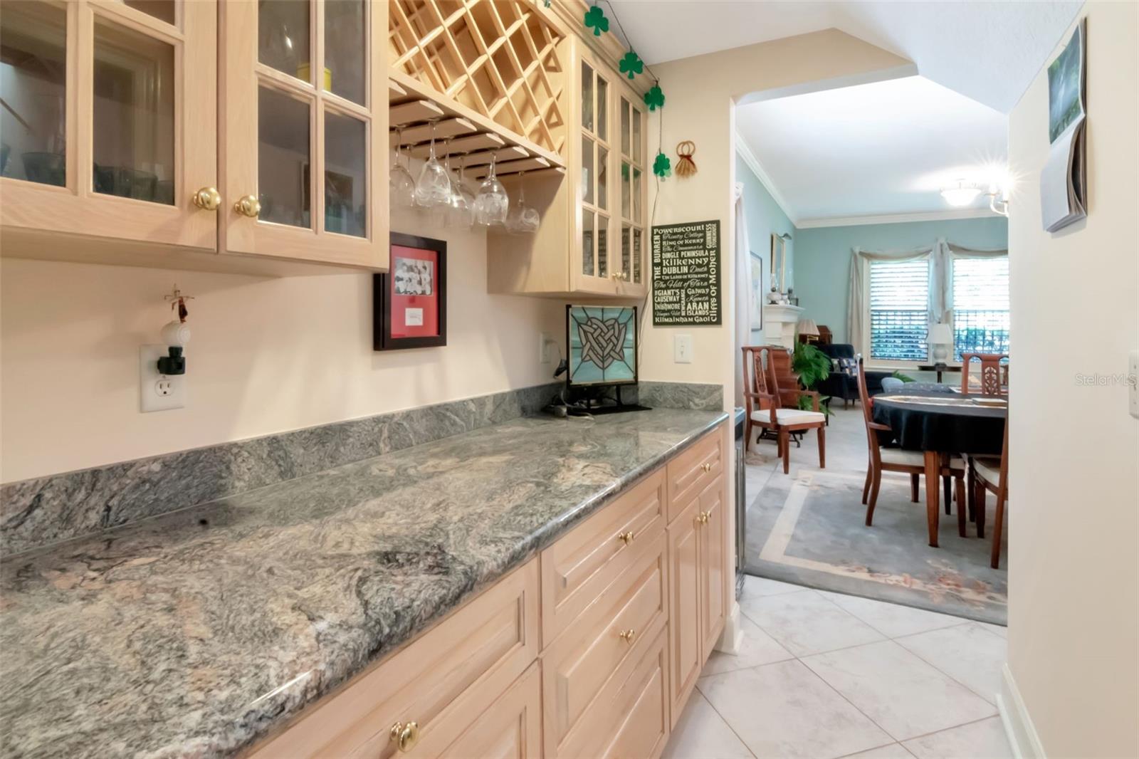 Butler's pantry between kitchen and dining room