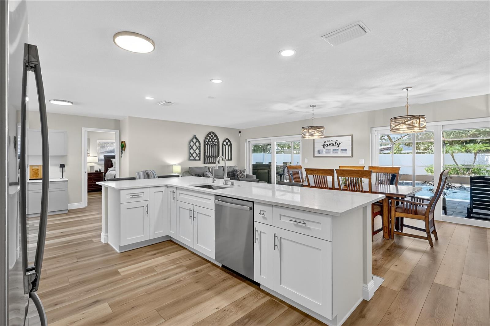 Open to the family room and pool.
