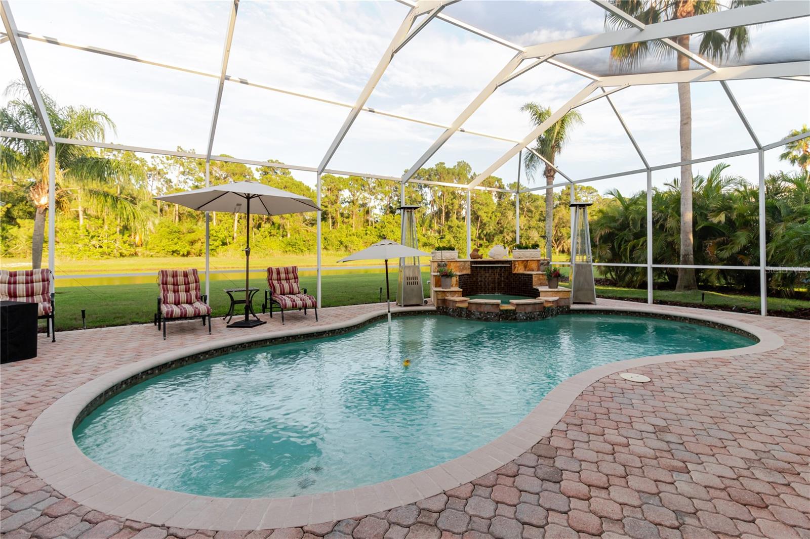 Pool with screened in Lanai