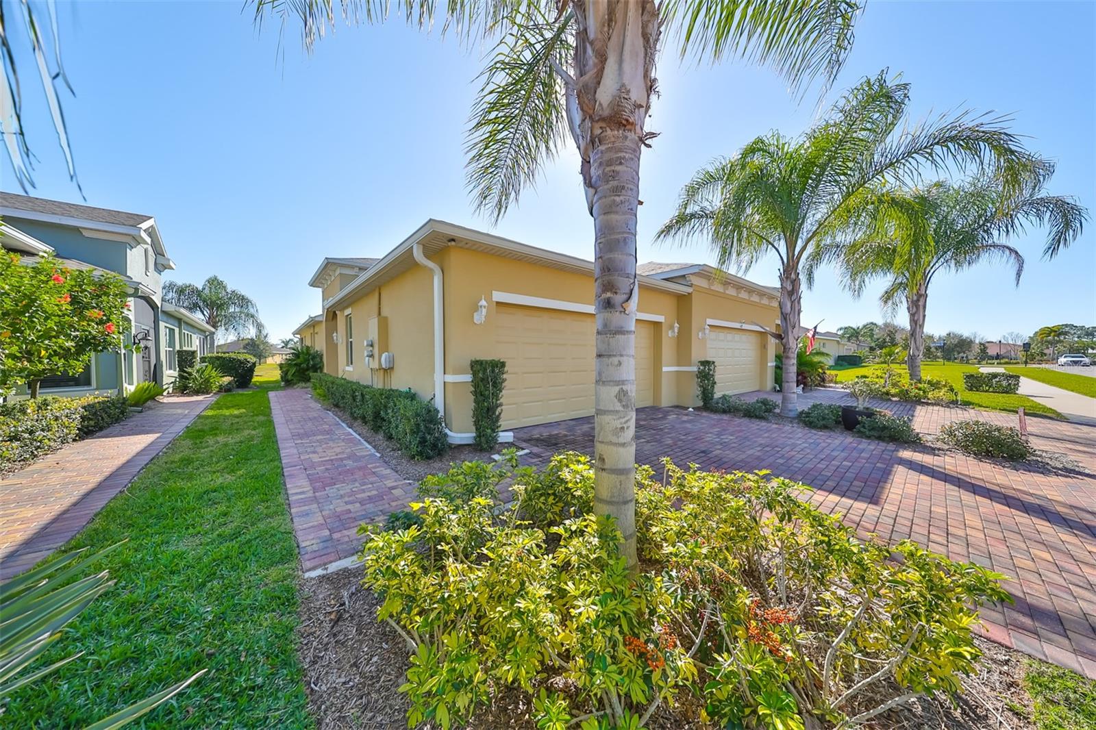 Notice the brick pavered walkways and driveways, adding a custom and high-end feeling to the neighborhood.