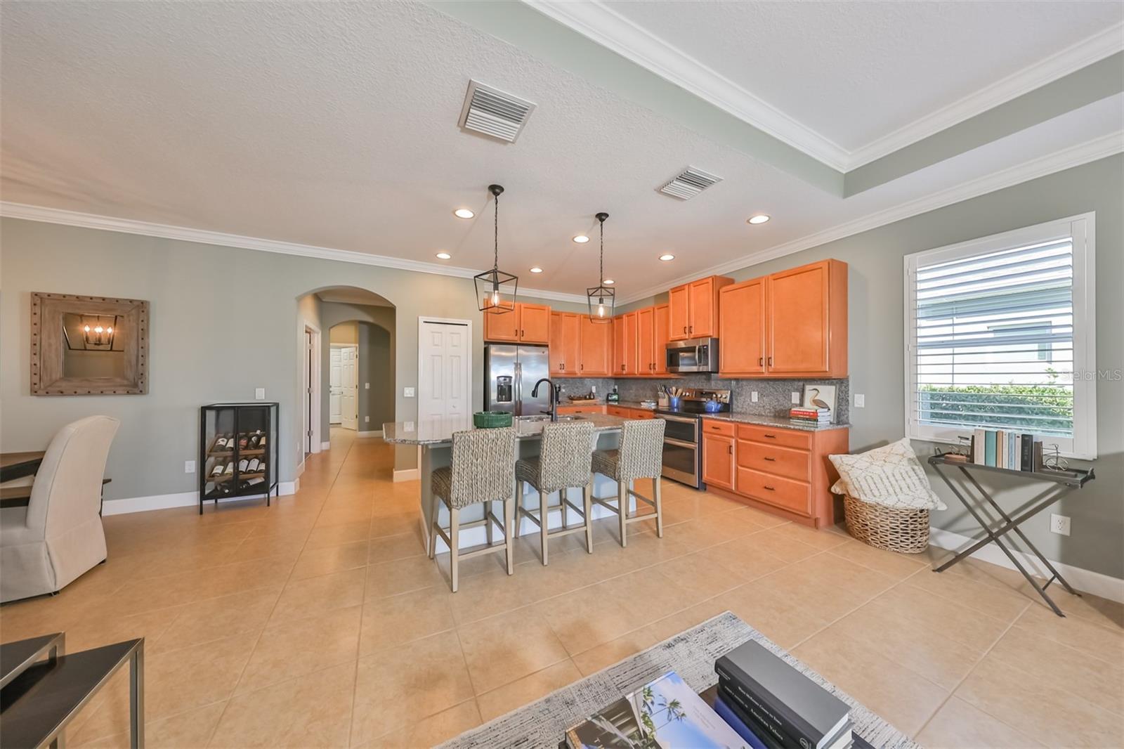 Modern 'coastal' paint tones are soothing and relaxing and tile floors throughout offer easy clean up.
