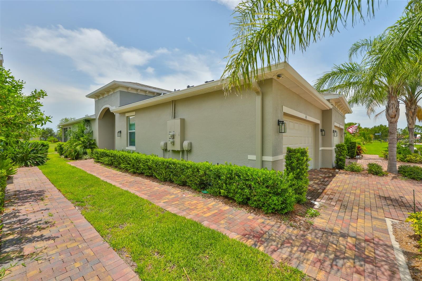 Manicured and thoughtfully landscaped to allow both beauty and easy maintenance.
