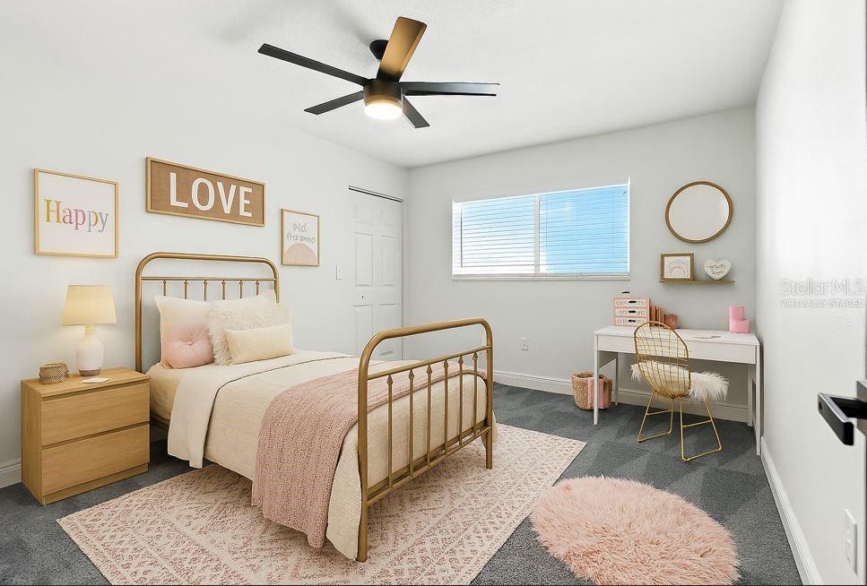 Virtually Staged -Bedroom 2 offers a spacious layout, tons of natural light, and a walk-in closet. Whether it’s for guests, kids, or a stylish home office, it’s ready to flex to your needs