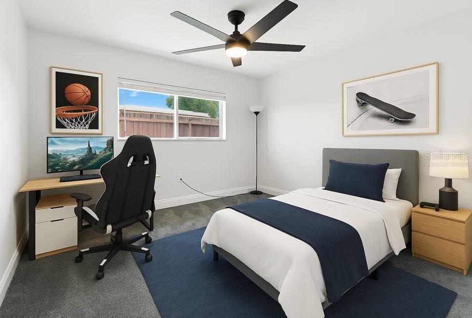 Virtually Staged - Bedroom 3 keeps it cool and versatile—whether it's a cozy guest suite, a dedicated workspace, or a kiddo's command center. The large window brings in great natural light, and the layout offers plenty of room to spread out and make it yours
